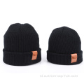 Volwassen kindre lederen label gebreide beanie hoed